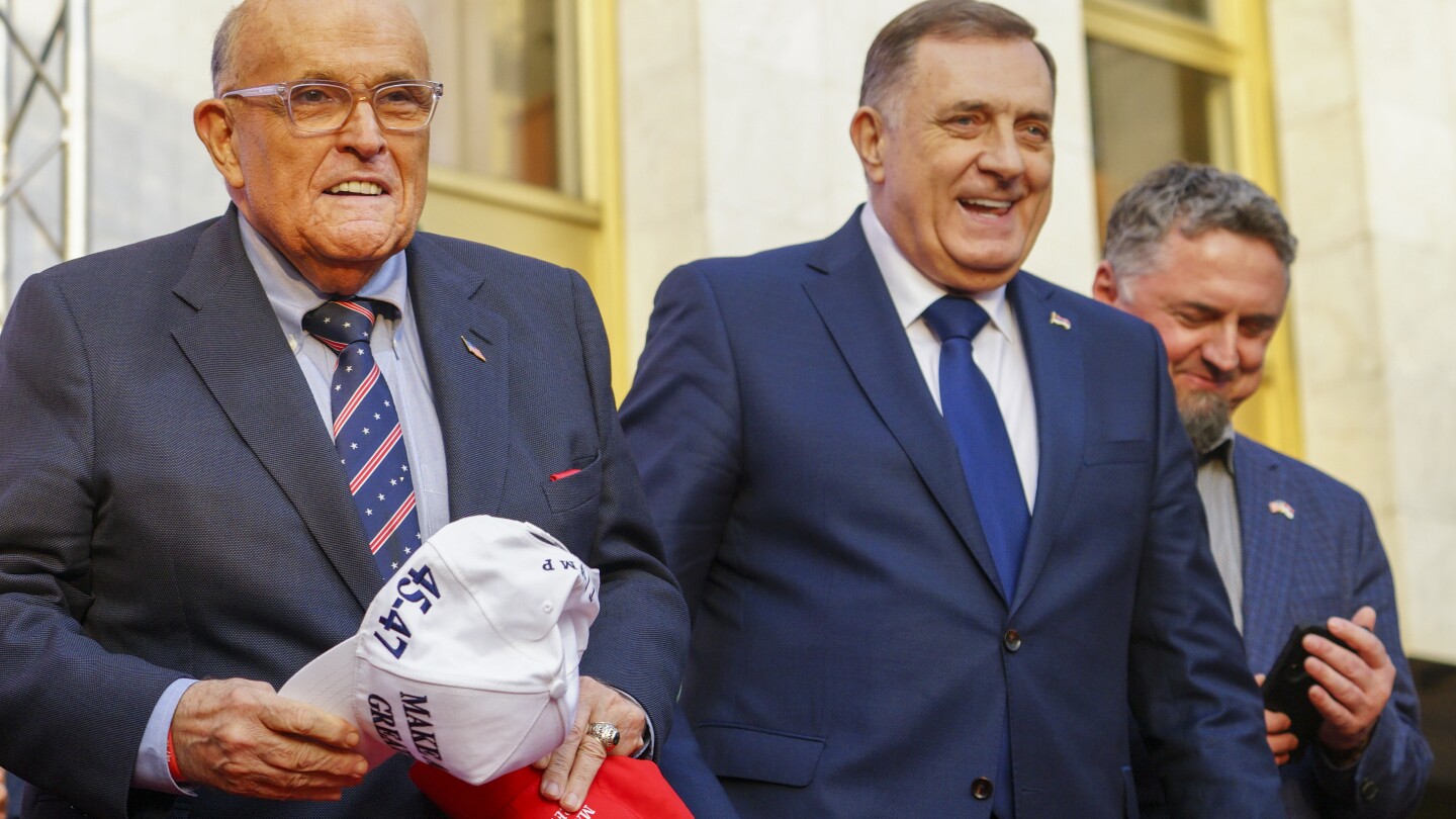 A court in Bosnia sentences separatist Bosnian Serb President Milorad Dodik to 1 year in prison