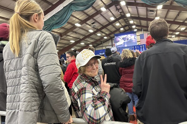 Jackie Garlock, of Clear Lake, Iowa, wears a white hat indicating her status as one of Donald Trump's 