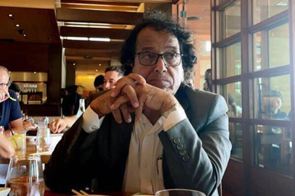 In this photo provided by Ibrahim Almadi, Saad Ibrahim Almadi sits in a restaurant in an unidentified place, in the United States, on August 2021. Almadi, 72, who is a citizen of both Saudi Arabia and the U.S., was arrested in Saudi Arabia last November and was recently sentenced to 16 years in prison over tweets critical of the Saudi government. (Ibrahim Almadi via AP)