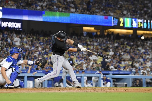 Marlins end Dodgers' win streak in style with 5 homers