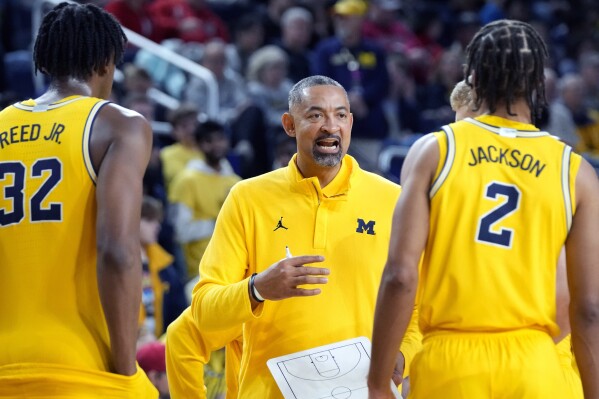 Michigan head coach Juwan Howard talks to his team during the second half of an NCAA college basketball game against Nebraska, Sunday, March 10, 2024, in Ann Arbor, Mich. Michigan fired Howard on Friday, March 15, 2024, after five seasons, 82-67 record and two NCAA Tournament. trips.(AP Photo/Carlos Osorio, File)