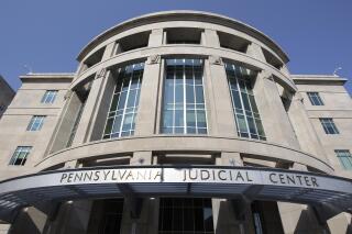 FILE – This July 27, 2009, file photo shows the Pennsylvania Judicial Center shortly after its completion in Harrisburg, Pa. The fate of a constitutional amendment for victims' rights that Pennsylvania voters apparently approved overwhelmingly nearly two years ago is about to go before the state's highest court. The state Supreme Court justices will hear oral argument in Harrisburg Tuesday, Sept. 21, 2021 regarding whether the so-called Marsy's Law amendment should have been split into more than just one ballot question. The court is considering whether to uphold a divided decision in January by Commonwealth Court. The lower court ruled it ran afoul of a Pennsylvania Constitution provision that requires amendments to address a single subject only. (AP Photo/Carolyn Kaster, File)