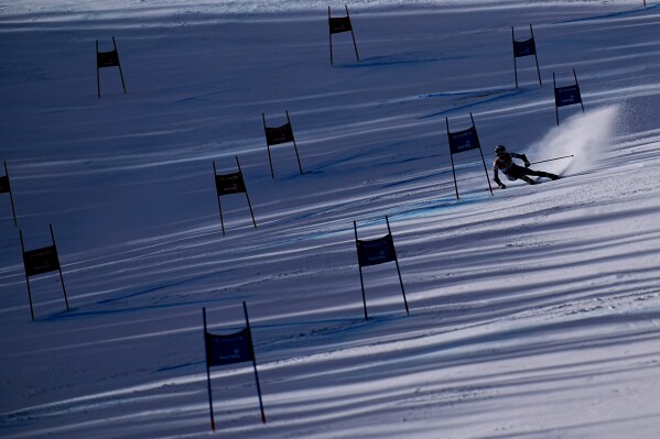 Aksel Kitt competes in a men's giant slalom ski race during the U.S. Alpine Championships, Friday, March 22, 2024, at the Sun Valley ski resort in Ketchum, Idaho. (AP Photo/John Locher)