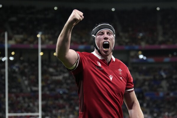 Wales' Adam Beard celebrates after the Rugby World Cup Pool C match between Wales and Australia at the OL Stadium in Lyon, France, Sunday, Sept. 24, 2023. Wales won the match 40-6. (AP Photo/Christophe Ena)