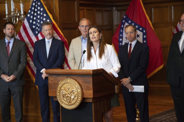 FILE - Arkansas Gov. Sarah Huckabee Sanders speaks at a newss conference to announce the opening of a new $33 million missile production facility on Thursday, Oct. 26, 2023 at the State Capitol in Little Rock, Ark. Huckabee Sanders is trying to move past an unusual controversy over a $19,000 lectern that she doesn't even want to use right now. An audit is underway over the purchase of the lectern that's prompted claims her office illegally altered records about it (AP Photo/Katie Adkins, File)