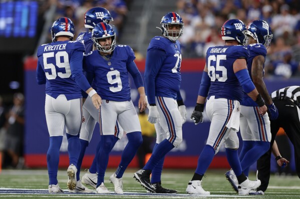New York Giants place-kicker Graham Gano (9) celebrates after kicking a field goal during the first half of an NFL preseason football game against the New York Jets, Saturday, Aug. 26, 2023, in East Rutherford, N.J. (AP Photo/Adam Hunger)