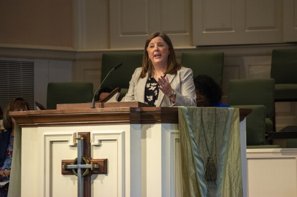 The Rev. Meredith Stone welcomes participants to the 2022 Baptist Women in Ministry Annual Gathering, June 28, 2022, at Wilshire Baptist Church, Dallas, Texas. The organization plans prayer gatherings in support of Baptist female pastors outside the Southern Baptist Convention’s annual meeting in Indianapolis June 11-12, 2024. (Baptist Women in Ministry, via AP)