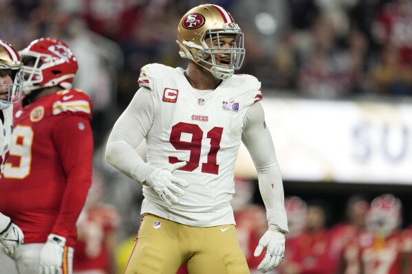 FILE - San Francisco 49ers defensive end Arik Armstead (91) celebrates a hit on Kansas City Chiefs quarterback Patrick Mahomes during the first half of the NFL Super Bowl 58 football game Sunday, Feb. 11, 2024, in Las Vegas. The 49ers are planning to cut their longest tenured player by releasing defensive tackle Arik Armstead in a salary cap move. A person informed of the team's decision said Armstead will be released and hit the open market after the start of the new league year, Wednesday, March 13, 2024. The person spoke on condition of anonymity because the team has not announced the move. (AP Photo/Ashley Landis, File)