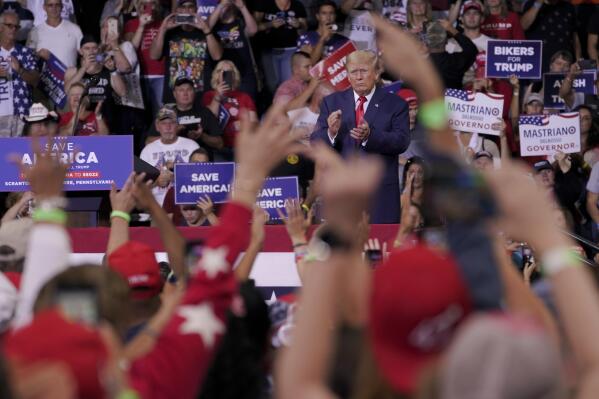FILE - Former President Donald Trump speaks at a rally in Wilkes-Barre, Pa., Sept. 3, 2022. Trump is increasingly embracing and endorsing the QAnon conspiracy theory, even as the number of frightening real-world incidents linked to the movement increase.(APPhoto/Mary Altaffer, File)