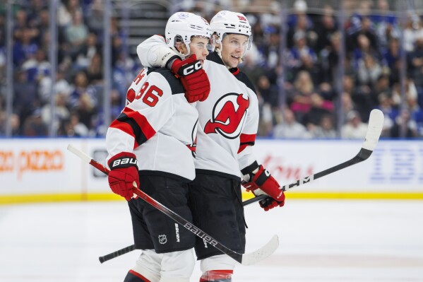 Devils All-Star Jack Hughes out for the rest of the season, will have shoulder  surgery | AP News