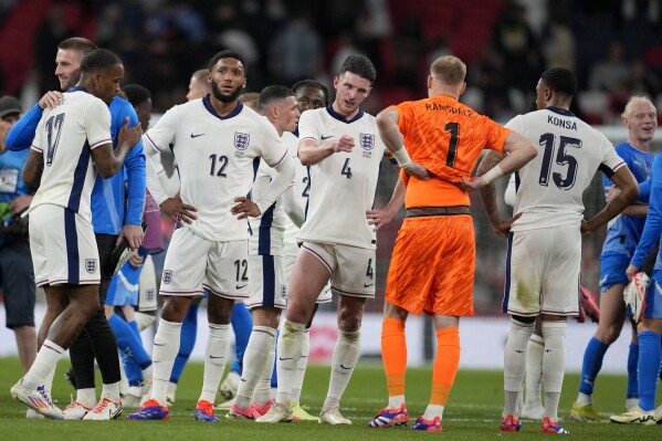 England players react after losing the International friendly soccer match between England and Iceland at Wembley stadium in London, Friday, June 7, 2024.(AP Photo/Kin Cheung)