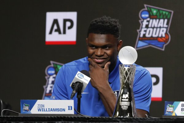 
              Duke freshman Zion Williamson answers questions at a news conference where he was awarded the Associated Press men's college basketball player of the year award at the Final Four NCAA college basketball tournament, Friday, April 5, 2019, in Minneapolis. (AP Photo/Charlie Neibergall)
            