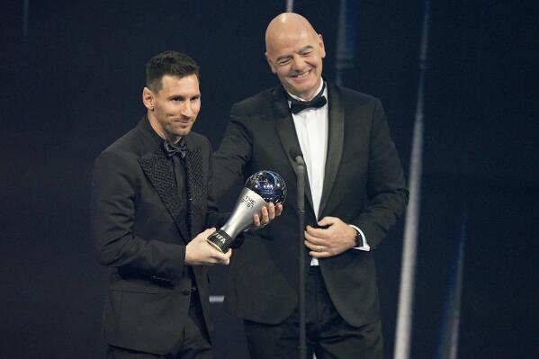 Argentina's Lionel Messi receives the Best FIFA Men's player award from FIFA president Gianni Infantino during the ceremony of the Best FIFA Football Awards in Paris, France, Monday, Feb. 27, 2023. (AP Photo/Michel Euler)