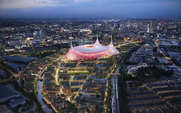 This undated and computer-generated picture, issued by Manchester United, shows an exterior view of the planned new Manchester United stadium. (Foster + Partner via AP)