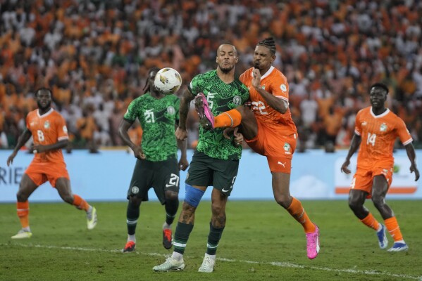 Ivory Coast 's Sebastien Haller, second right, scores his side's second goal during the African Cup of Nations final soccer match between Ivory Coast and Nigeria, at the Olympic Stadium of Ebimpe in Abidjan, Ivory Coast, Sunday, Feb. 11, 2024. (APPhoto/Themba Hadebe)