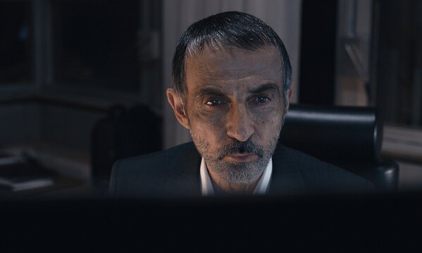This image released by Apple TV+ shows Shaun Toub as Faraz Kamali in a scene from "Tehran." (Apple TV+ via AP)