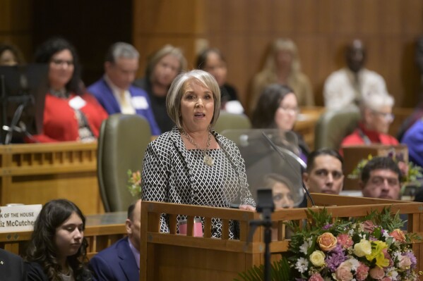 New Mexico Governor Michelle Lujan Grisham delivers her State of the State speech for the start of the 56th Legislature at the Capitol, Tuesday, Jan. 16, 2024, in Santa Fe, N.M. (AP Photo/Roberto E. Rosales)