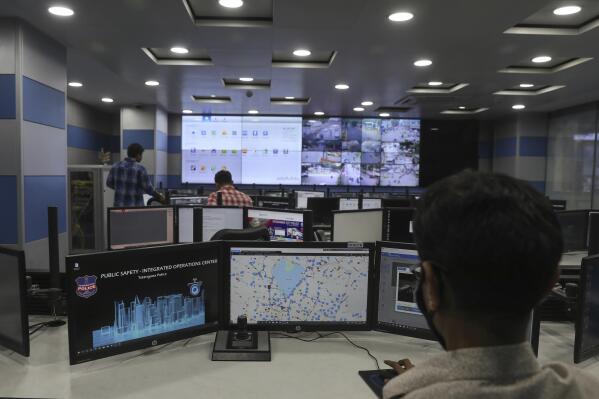 Employees work in the Command and Control Center at the Hyderabad Police Headquarters in Hyderabad, India, Thursday, April 21, 2022. (AP Photo/Mahesh Kumar A.)