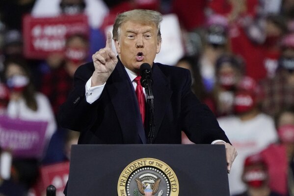 President Donald Trump speaks at a campaign rally, Saturday, Sept. 19, 2020 at the Fayetteville Regional Airport in Fayetteville, N.C. There were two men in 1980s Manhattan who craved validation — one a past president, one a future president. That’s how a thirty-something Donald Trump and a seventy-ish Richard Nixon struck up a decade-long correspondence in the 1980s that meandered from football and real estate to Vietnam and media strategy. Their letters are being revealed for the first time in an exhibit that opens Thursday at the Richard Nixon Presidential Library & Museum. (AP Photo/Chris Carlson)