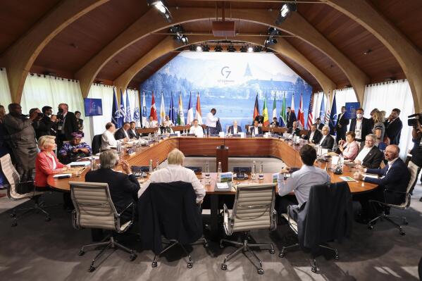 A general view of a G7 leaders meeting with outreach guests as part of the working session of the G7 leaders summit at Castle Elmau in Kruen, near Garmisch-Partenkirchen, Germany, on Monday, June 27, 2022. The Group of Seven leading economic powers are meeting in Germany for their annual gathering Sunday through Tuesday. (Lukas Barth/Pool Photo via AP)