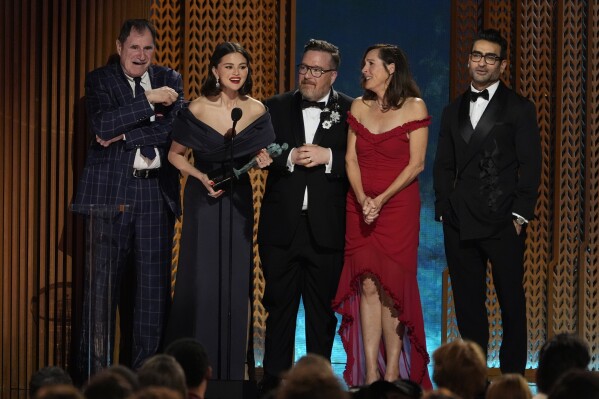 Richard Kind, from left, Selena Gomez, Michael Cyril Creighton, Molly Shannon, and Kumail Nanjiani accept the award for outstanding performance by an ensemble in a comedy series for "Only Murders In The Building" during the 31st annual Screen Actors Guild Awards on Sunday, Feb. 23, 2025, at the Shrine Auditorium in Los Angeles. (AP Photo/Chris Pizzello)