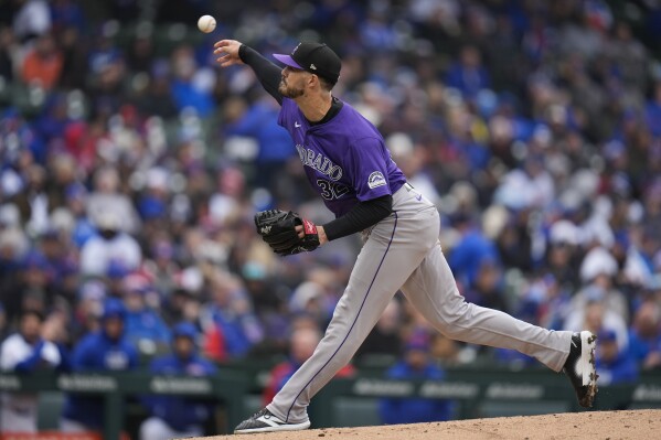 Colorado Rockies starting pitcher Dakota Hudson throws against the Chicago Cubs during the second inning of a baseball game Monday, April 1, 2024, in Chicago. (AP Photo/Erin Hooley)