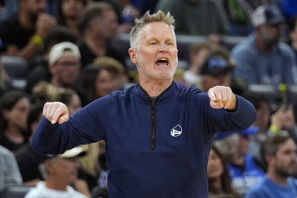 Warriors coach Steve Kerr says officials need to call traveling 'for the  good of the game' | AP News