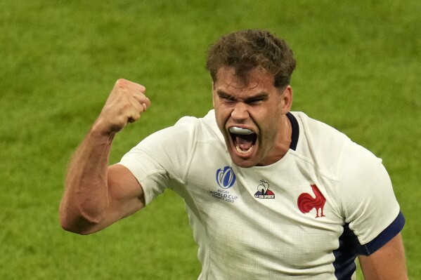 France's Damian Penaud reacts after his team won a turnover during the Rugby World Cup Pool A match between France and New Zealand at the Stade de France in Saint-Denis, north of Paris, Friday, Sept. 8, 2023. (AP Photo/Themba Hadebe)