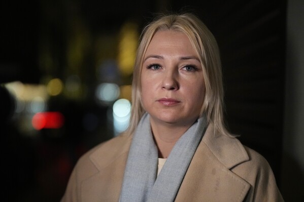 Yekaterina Duntsova looks on after submitting her documents as a presidential candidate for the upcoming presidential election to Russia's Central Election Committee, in Moscow, Russia, Wednesday, Dec. 20, 2023. Duntsova is a journalist-turned-grassroots campaigner and local legislator. She secured a nomination from a group of more than 500 supporters as required by Russian electoral law from those not running on a party ticket. Delegates from Russia’s ruling party unanimously backed President Vladimir Putin’s bid for reelection at a party conference in Moscow on Sunday. (AP Photo/Alexander Zemlianichenko)