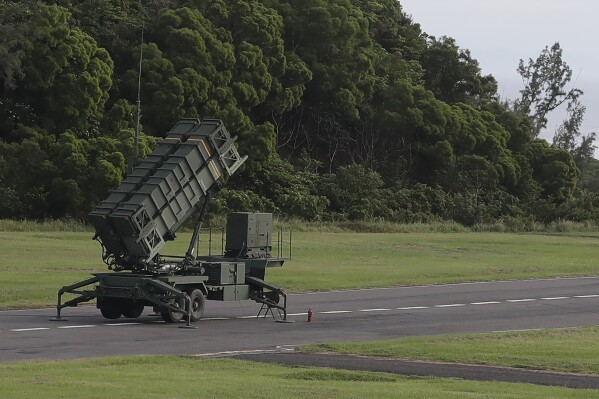 A MIM-104C (PAC-2) Patriot short-range anti-aircraft missile launcher is prepared during a drill in Pingtung County, southern Taiwan, Tuesday, Aug. 20, 2024. (AP Photo/Chiang Ying-ying)