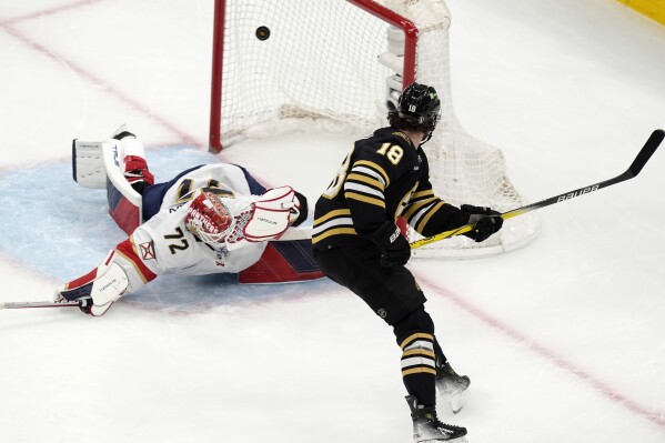 Boston Bruins' Pavel Zacha (18) scores on Florida Panthers' Sergei Bobrovsky (72) during the first period in Game 6 of an NHL hockey Stanley Cup second-round playoff series Friday, May 17, 2024, in Boston. (AP Photo/Michael Dwyer)