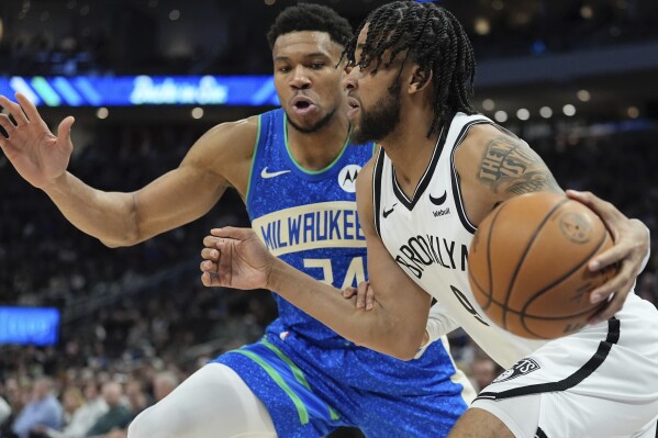 Lillard sparkles, Antetokounmpo returns to help Bucks hold off Nets, 115-108  | AP News