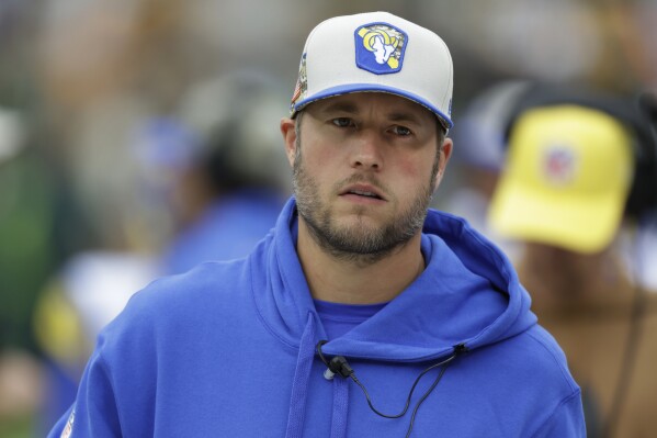 Los Angeles Rams quarterback Matthew Stafford stands on the sideline during the first half of an NFL football game against the Green Bay Packers, Sunday, Nov. 5, 2023, in Green Bay, Wis. (AP Photo/Matt Ludtke)