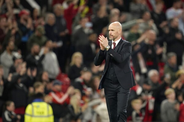 Manchester United's head coach Erik ten Hag walks on the pitch at the end of the English Premier League soccer match between Manchester United and Newcastle United, in Manchester, England, Wednesday, May 15, 2024. (AP Photo/Dave Thompson)