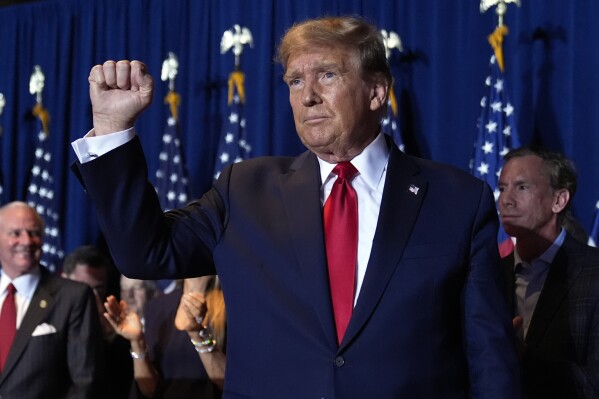 Republican presidential candidate former President Donald Trump reacts at a primary election night party at the South Carolina State Fairgrounds in Columbia, S.C., Saturday, Feb. 24, 2024. (AP Photo/Andrew Harnik)