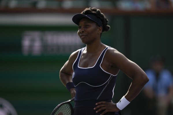 Venus Williams, of the United States, reacts to losing a point to Nao Hibino, of Japan, at the BNP Paribas Open tennis tournament, Thursday, March 7, 2024, in Indian Wells, Calif. (AP Photo/Ryan Sun)