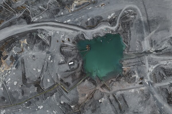 An aerial view of a sump at the Cobre Panama copper open-pit mine during a press tour of the mine, owned by Canada's First Quantum Minerals, in Donoso, Panama, March 21, 2025. (AP Photo/Matias Delacroix, File)