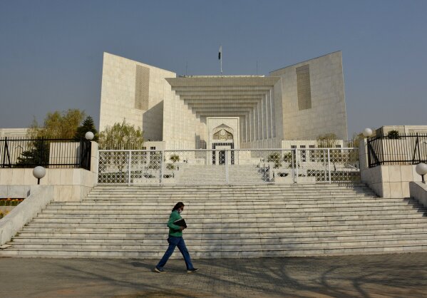 An appeal hearing in the Daniel Pearl murder case was held at the Supreme Court, in Islamabad, Pakistan, Thursday, Jan. 28, 2021. The court on Thursday has ordered the release of Ahmad Saeed Omar Sheikh who was convicted and later acquitted in the gruesome beheading of American journalist Pearl in 2002. The court also dismissed an appeal of Sheikh's acquittal by Pearl's family. (AP Photo/Waseem Khan)