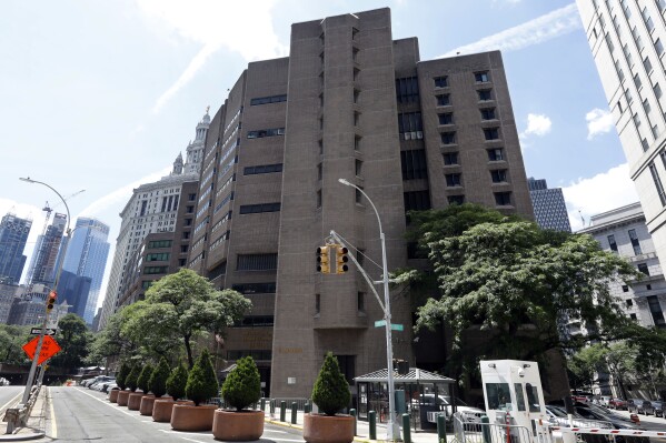 FILE - The Manhattan Correctional Center appears in this July 1, 2019 photo, in New York. New York Mayor Eric Adams' administration suggested in a letter, to New York Gov. Kathy Hochul on Aug. 9, 2023, that it wants to house migrants in a notorious federal jail that was closed after disgraced financier Jeffrey Epstein's suicide there led to its squalid conditions being deemed unsafe for humans. (AP Photo/Richard Drew, File)