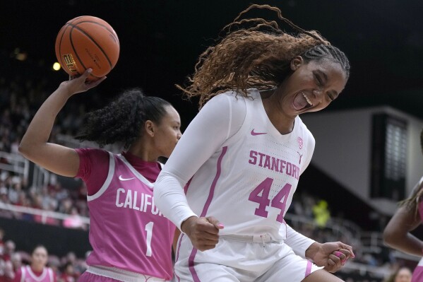 Stanford forward Kiki Iriafen (44) reacts after teammate Hannah Jump scored against California during the first half of an NCAA college basketball game Friday, Feb. 16, 2024, in Stanford, Calif. (AP Photo/Tony Avelar)