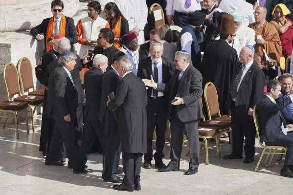 Different religious delegations arrive for Pope Leo XIV's formal inauguration of his pontificate with a Mass in St. Peter's Square attended by heads of state, royalty and ordinary faithful, at the Vatican, Sunday, May 18, 2025. (AP Photo/Stefano Costantino)