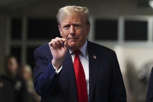 Former President Donald Trump speaks after leaving Manhattan criminal court, Tuesday, April 23, 2024, in New York. Trump is accused of falsifying internal business records as part of an alleged scheme to bury stories he thought might hurt his presidential campaign in 2016. (AP Photo/Yuki Iwamura, Pool)