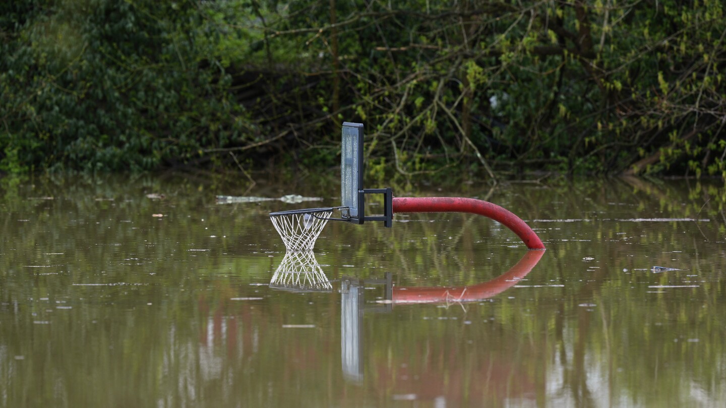 At least 16 dead in flooding and tornadoes as storms slash US South and Midwest