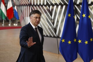 FILE - Croatia's Prime Minister Andrej Plenkovic gestures as he arrives for an EU summit in Brussels, Thursday, Feb. 1, 2024. Croatia's parliament was dissolved on Thursday, March 14, 2024 to pave the way for a parliamentary election later this year. The election date has not been set, though Prime Minister Plenkovic has suggested it should be held before the vote for the European Parliament in early June. (AP Photo/Omar Havana, File)