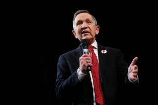 
              FILE - In this April 10, 2018, file photo, former U.S. Rep. Dennis Kucinich, of Ohio speaks during the Ohio Democratic Party's fifth debate in the primary race for governor at Miami (OH) University's Middletown campus in Middletown, Ohio. Kucinich is returning a $20,000 speaking fee he received last year from a group sympathetic to Syrian President Bashar Assad. The Democratic candidate for Ohio governor announced his decision in a letter sent Thursday, April 26, 2018, to The Plain Dealer. (AP Photo/John Minchillo, File)
            