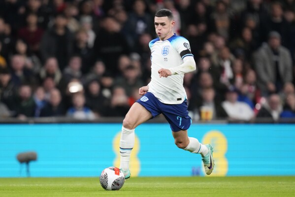 FILE - England's Phil Foden in action during the Euro 2024 group C qualifying soccer match between England and Malta at Wembley stadium in London, Friday, Nov. 17, 2023. The Associated Press takes a look at some of the players expected to light up the European Championship in Germany which kicks off on June 14. (AP Photo/Kirsty Wigglesworth, File)