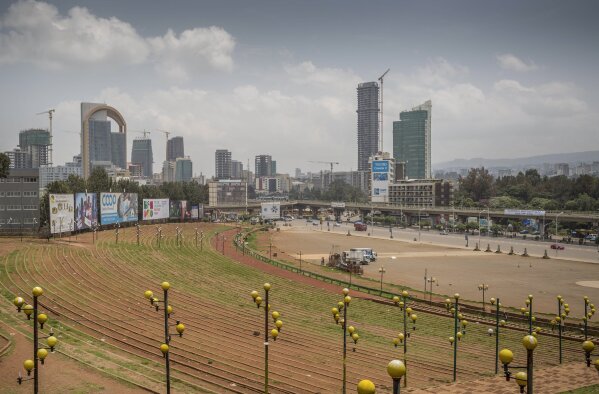 Meskel Square stands empty in central Addis Ababa, Ethiopia, Sunday, June 23, 2019. Ethiopia's government foiled a coup attempt in a region north of the capital and the country's military chief was shot dead, the prime minister Abiy Ahmed said Sunday in a TV announcement.  (AP Photo/Mulugeta Ayene)