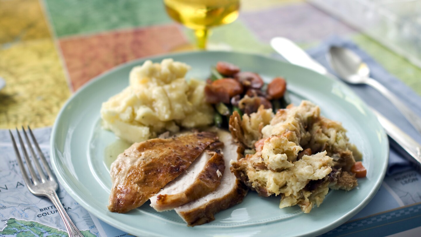 Turkey rules the table. But an AP-NORC poll finds disagreement over other Thanksgiving classics