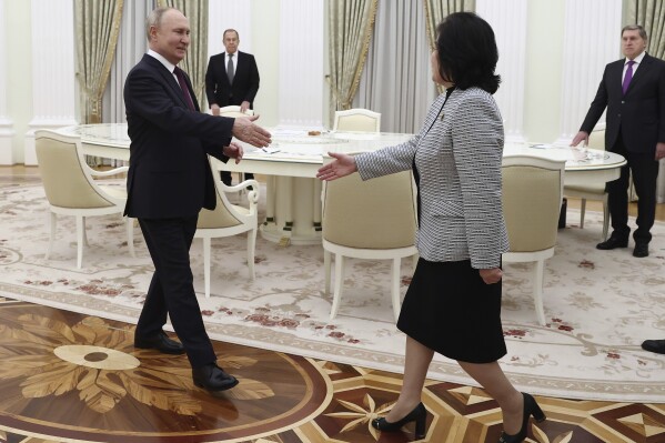 Russian President Vladimir Putin greets North Korean Foreign Minister Choe Son Hui during their meeting at the Kremlin in Moscow, Russia, Tuesday, Jan. 16, 2024. (Artyom Geodakyan, Sputnik, Kremlin Pool Photo via AP)