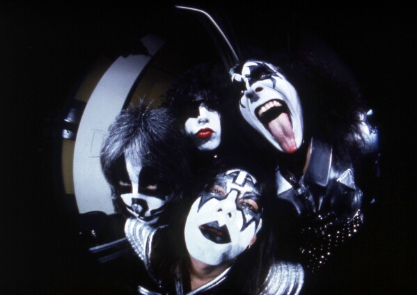 FILE - Members of the rock group KISS; Gene Simmons, clockwise from right, Ace Frehley, Peter Criss and Paul Stanley are photographed before a concert in Hartford, Conn.,on Feb. 16, 1977. Frehley was replaced by Tommy Thayer in 2002. Criss left the band in 1980 but returned, and left again in 2004. The band's final two shows, featuring Simmons, Stanley, Thayer and Eric Singer, are scheduled for Dec. 1 and 2 at Madison Square Garden in New York. (AP Photo/Richard Drew, File)